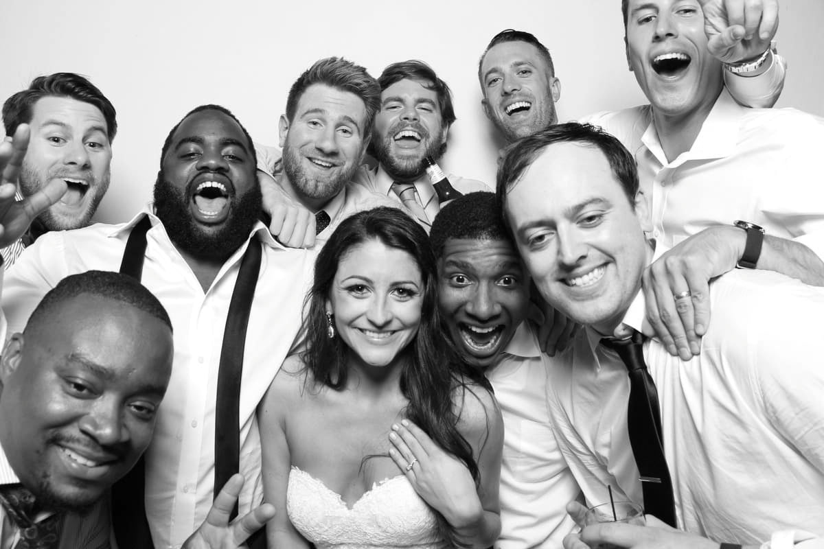 Black and White Wedding Photo Booth Picture with Bride and Groomsmen