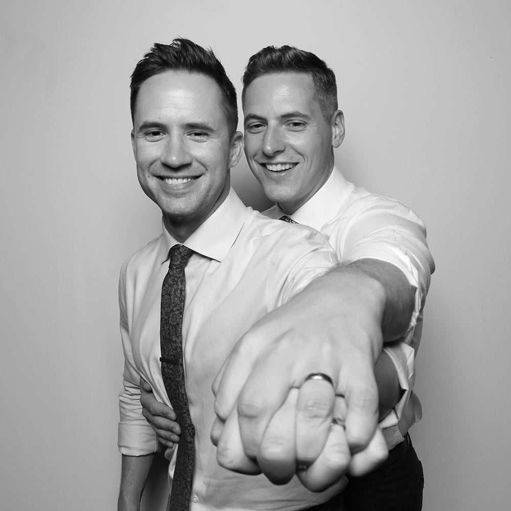 Black and White Photo Booth Picture with Newlywed Couple