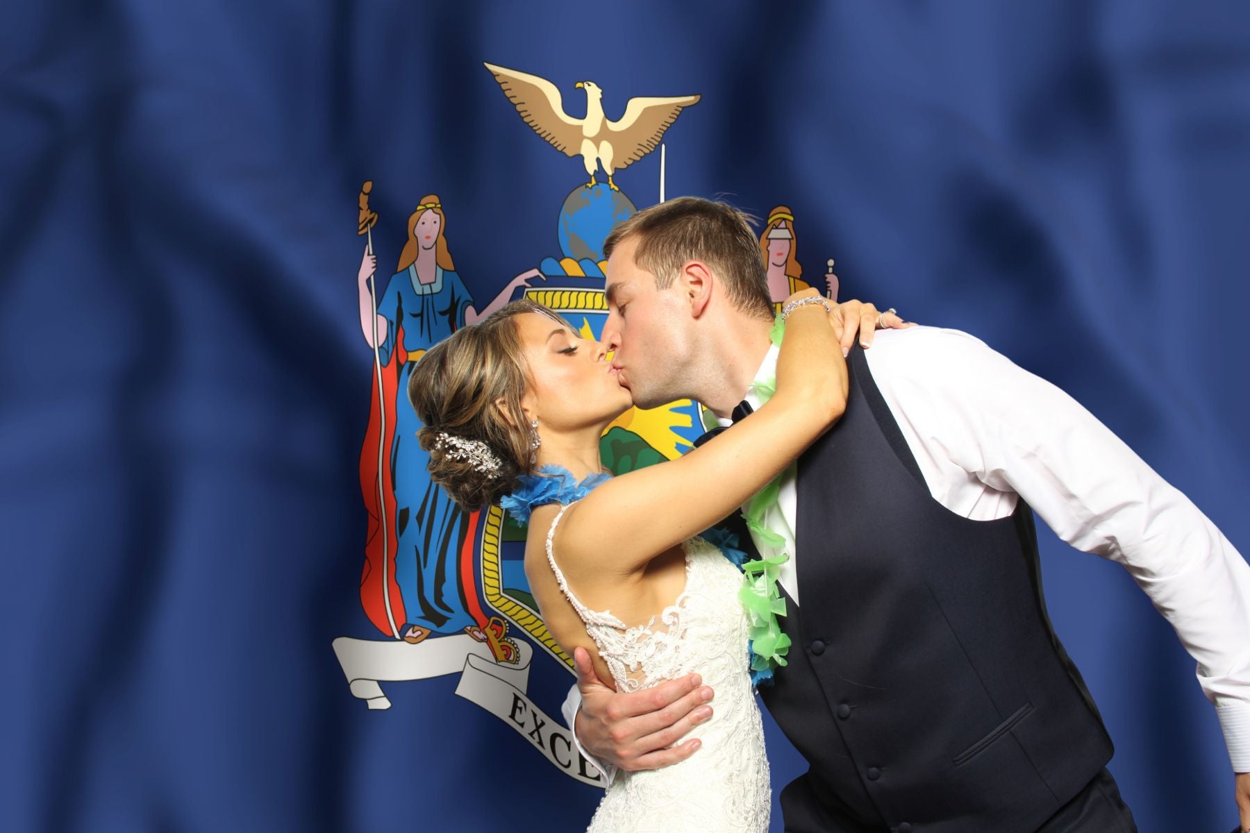 Bride and Groom Kissing in a New York City Photo Booth